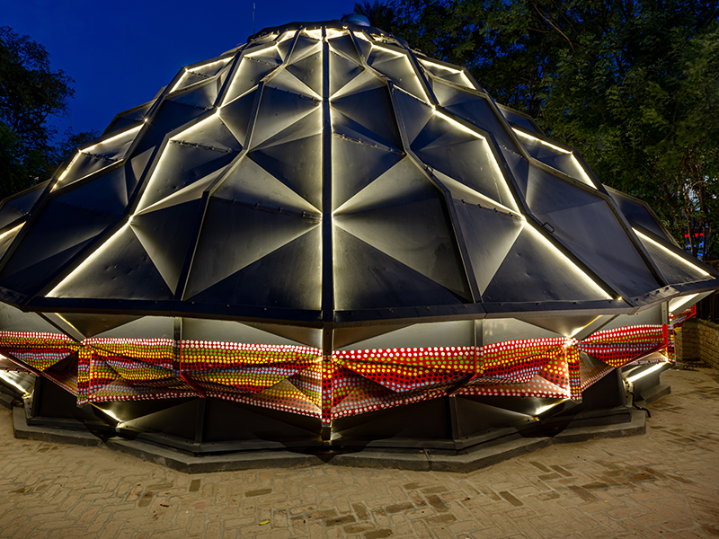 The faceted shell of Darwin Bucky comes alive at dusk, as ambient lighting weaves through its geometric ridges. (Image Credits: Vinay Panjwani)