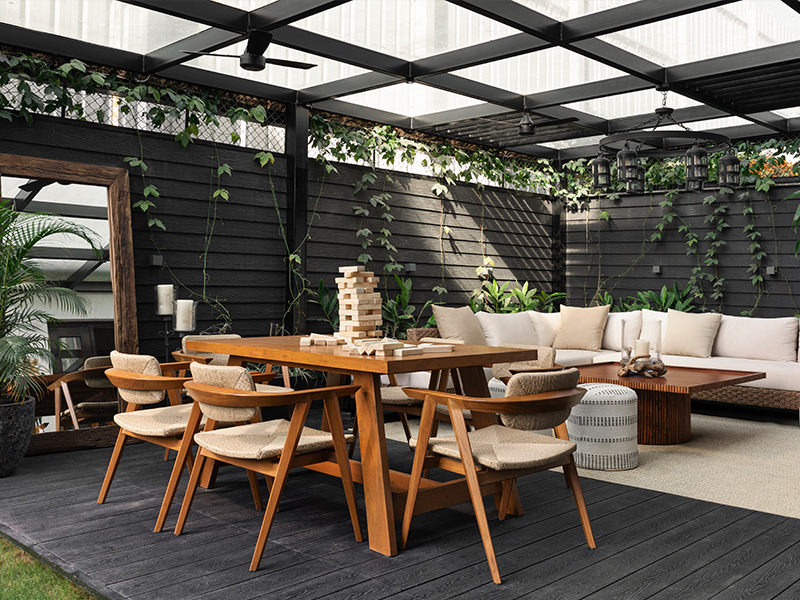 The dining table and chairs are from Outdoor Connections, the centre table from Objectry, and the décor from Beruru.(Image Credits: Phosart Studio)