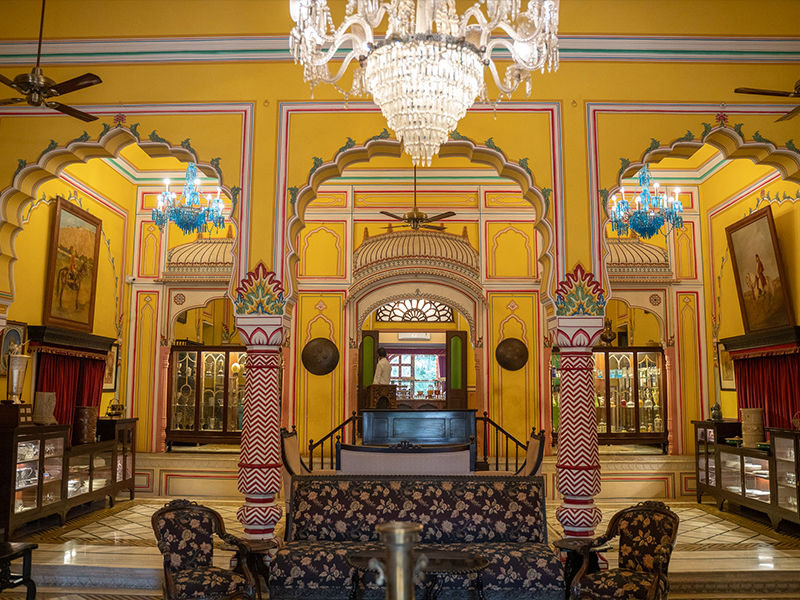 The flamboyant palette paired with intricate frescoes hints at an Art Deco ambience. (Image Credits: Courtesy of Hotel Narain Niwas)