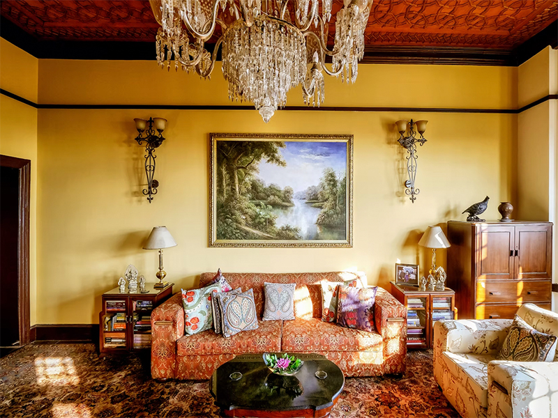 The standout is the ground-floor suite, offering private access to a sprawling lawn, an exclusive outdoor dining area, and a generously sized living room. (Image Credit: Karan Mahal)