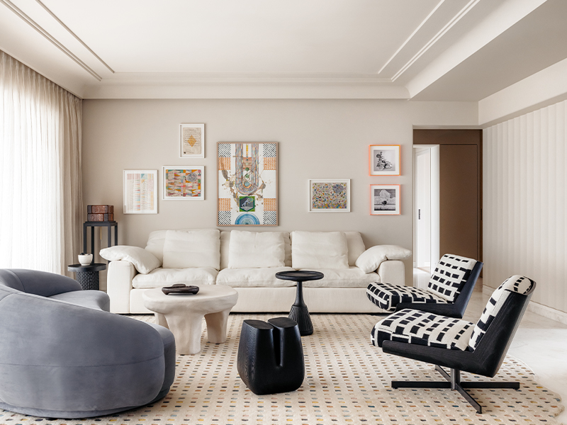 At Apartment O2 by Purple Backyard, the art pieces from Ayushi Patni and Divya Pamnani, and others from the family’s collection add an eccentric touch, becoming conversation-starters. (Image Credits: Lokesh Dang and Styling Credits: Samir Wadekar)
