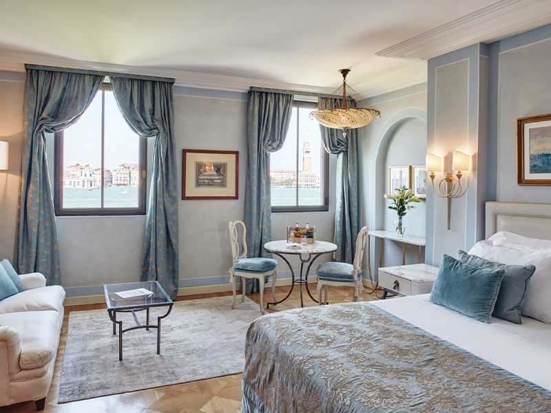 The St. Mark View Suite sits across a floral pathway in the Casanova Gardens, offering serene seclusion just steps from the main section of Hotel Cipriani. (Image Credit: Belmond)