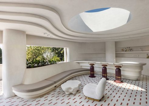The Equinox Home, conceived by Design i.O., unfolds across 9,000 sq. ft. with sculptural furniture, earthy hues and an homage to modern eclecticism.