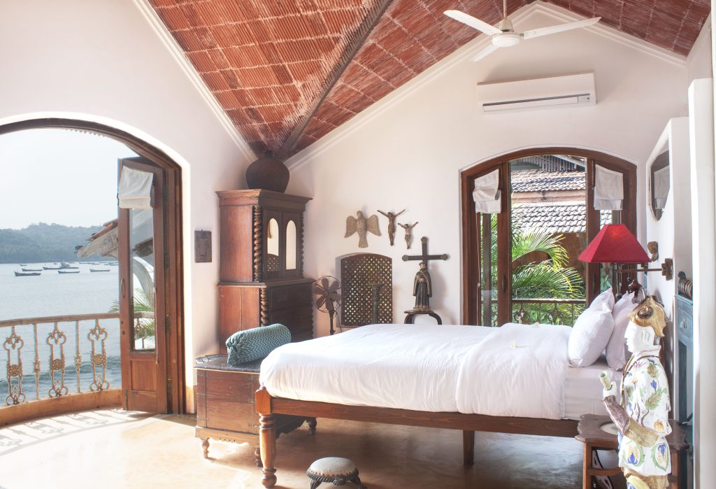 The Mangalore tiled sloping roof, wooden accents paired with arches leading to endless views, almost blur the boundaries between the sea and the property. (Image Credits: Courtesy of Ahilya by the Sea)