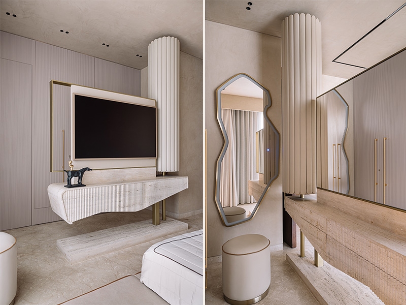 Left: In the bedroom, a bespoke sculptural console with fluted detailing and a cylindrical silhouette functions as the TV unit. Right: On the other side, this sculptural console from Poshway transforms into a vanity, paired with a mirror from Poshway, offering privacy while maintaining the room’s seamless flow and refined aesthetic. (Image Credits: Ishita Sitwala)