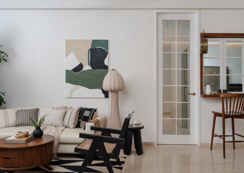 In this high-rise retreat by Mustard Design Studio, off-white walls, low-slung furniture, and botanical nods create a home that filters the buzz of Mumbai into something deeply personal.