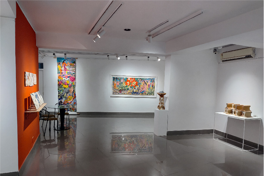 The pristine white walls serve as a perfect backdrop to the vibrant painting of multiple artists in a show titled ‘Whole within Fragments’. (Image Credits: Courtesy of Galerie 88)