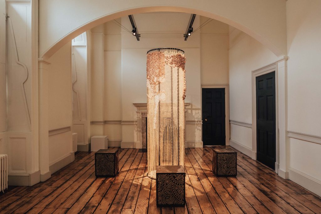 The strength of the Global South is in a delicate drape of gold and cowrie shells. (Image credits: Wura, London Design Biennale, 2025)
