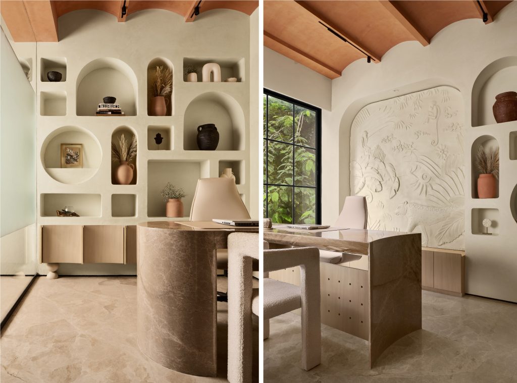 The office features two main cabins, each adorned with a functional backdrop of carved-out niches. Beige cabin chairs by Wabi-Sabi paired with handcrafted marble desks lend an air of sophistication. (Image Credits: Yadnyesh Joshi)
