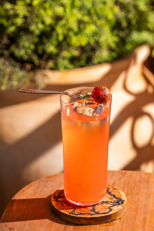 The Pizza-illa is a bold blend of tequila and house-made pesto soda that serves up a slice in a glass. (Image Credits: Courtesy of Mamma Killa)
