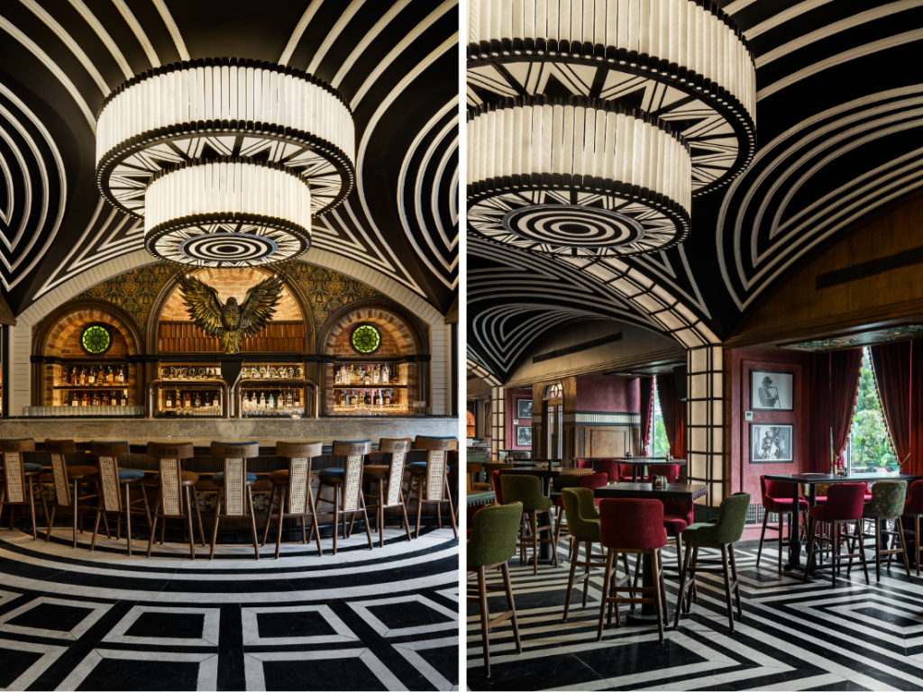 While the ceiling and floor play with high contrast and geometry, warm wood, cane furniture, and theatrical lighting temper the visual drama, making the space both dynamic and intimate. (Image credits: Shamanth Patil) 