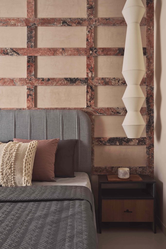 Akin to stacked diamonds, a pendant light from Thakur Lamps floats like a sentinel, echoing the room’s crisp design lexicon. (Image Credits: Yadnyesh Joshi)
