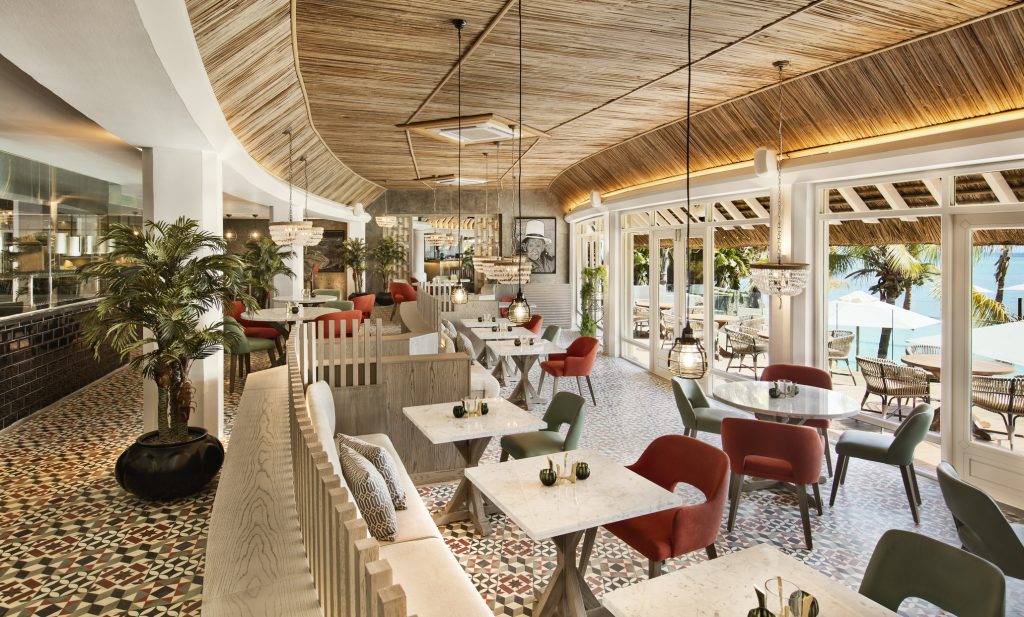 The resort’s open public spaces, home to six restaurants and seven bars, exude barefoot luxury with playful quirks. Peruvian restaurant INTI bursts with vibrant colours, adding to its charm. (Image Credit: LUX* Grand Gaube)