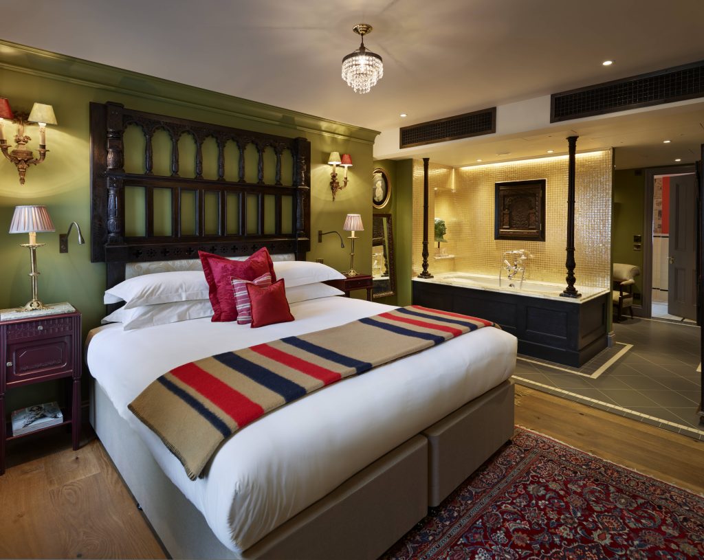 Each of the four Junior Suites offers its unique style and layout. A signature in-room bathtub adds an indulgent touch of luxury, adding a layer of private luxury to the space. Image Credit: (Darren Chung)