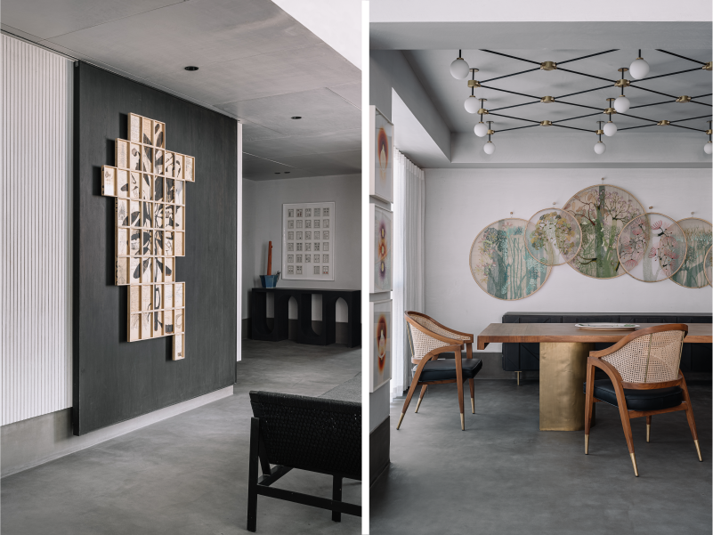 Left: The grid-based modular artwork in the hallway is by Sunil Padwal. A striking sculpture by Sukhdev Rathod stands atop a deep black console by KBP Interior Projects. Right: The dining table and cane chairs furniture is built in-house by KBP Interior Projects. The circular embroidered panels are curated from Flora For Fauna. (Image Credits: Ishita Sitwala) 