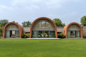 Rammed Earth And Brick Vaults Shape A Grounded Vadodara Retreat