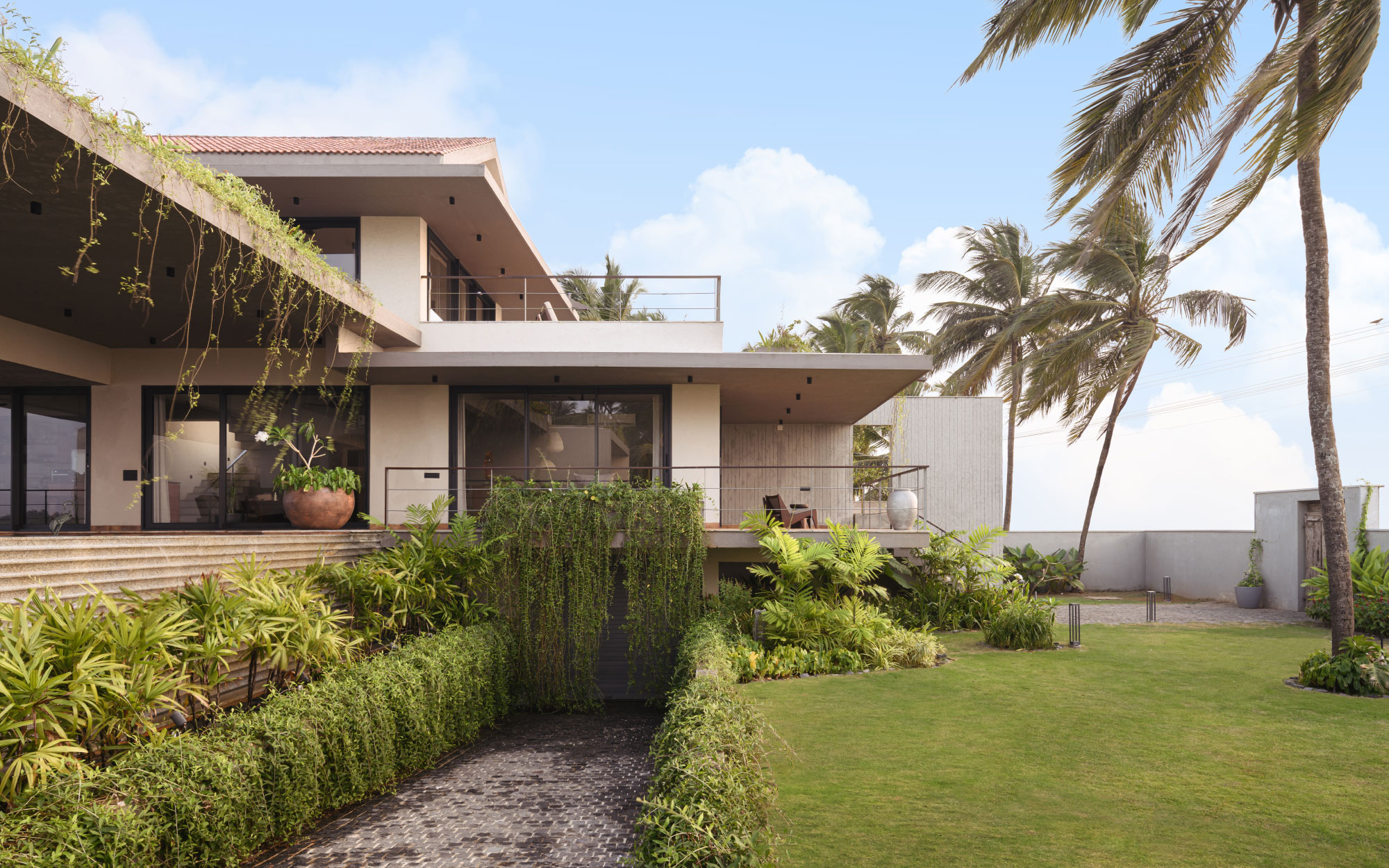 Alignment along the east-west axis ensures that the house is protected from harsh sunlight while also offering vantage views of the river and sea. (Image Credits: Justin Sebastian, Athul Niranjan)