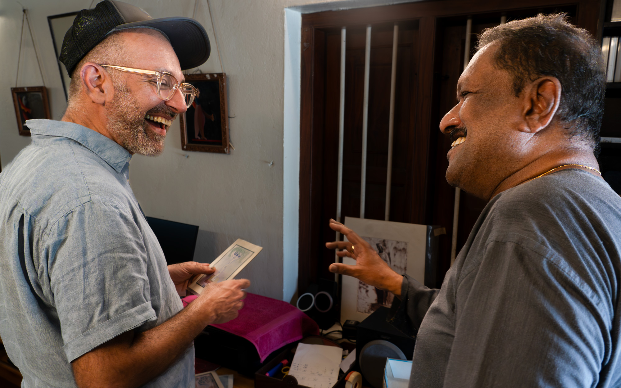 Nikhil Chopra with artist Babu Xavier at his studio in Kovalam. (Image courtesy of Kochi Muziris Biennale)