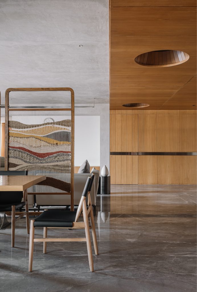 The dining table and chairs are crafted as bespoke pieces by Shiv Shakti Furniture. (Image Credit: Ishita Sitwala)