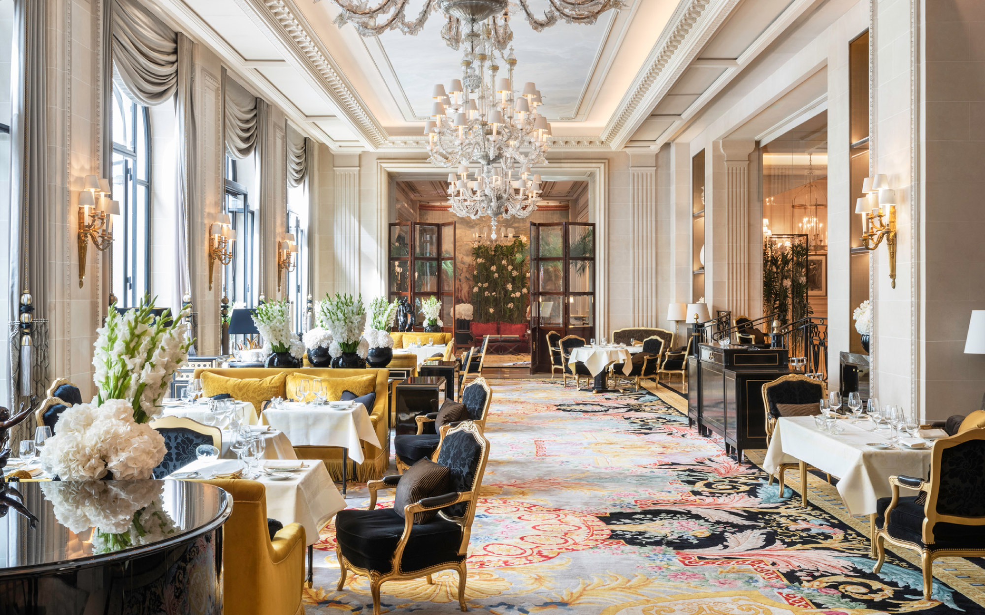 Four Seasons Hotel George V brings haute Parisian elegance to life through ornate mouldings, luminous chandeliers and meticulously curated floral installations. (Image Credits: Four Seasons Hotel George V)