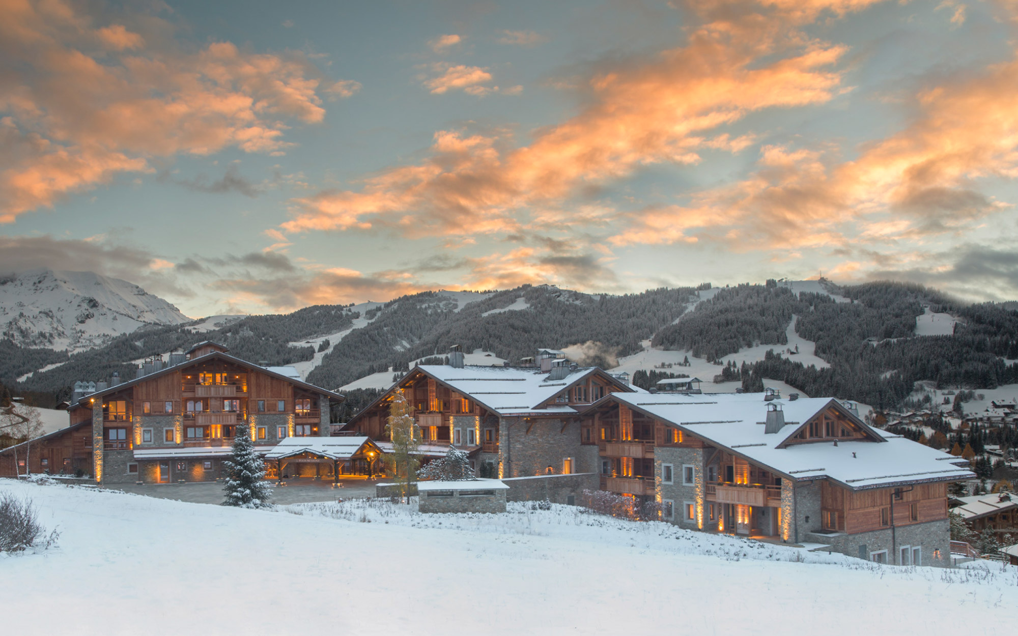 Set within a sweeping alpine landscape, Four Seasons Hotel Megève pairs traditional chalet architecture with contemporary craftsmanship. (Image Credits: Four Seasons Hotel Megève)
