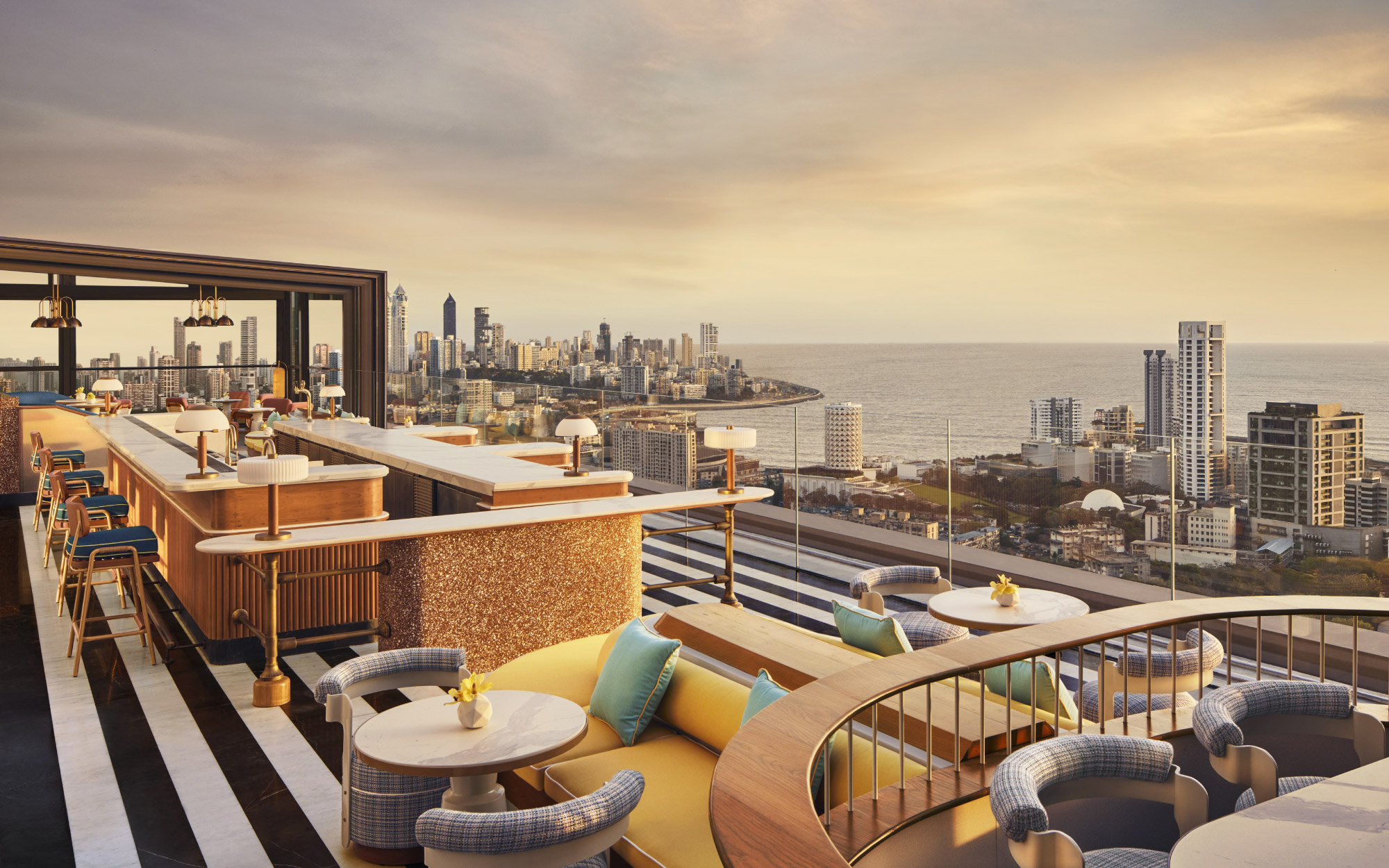 Cruising into sunset, where the ocean breeze, golden light, and a nautical mood come together effortlessly. (Image Credit: Four Seasons Mumbai)