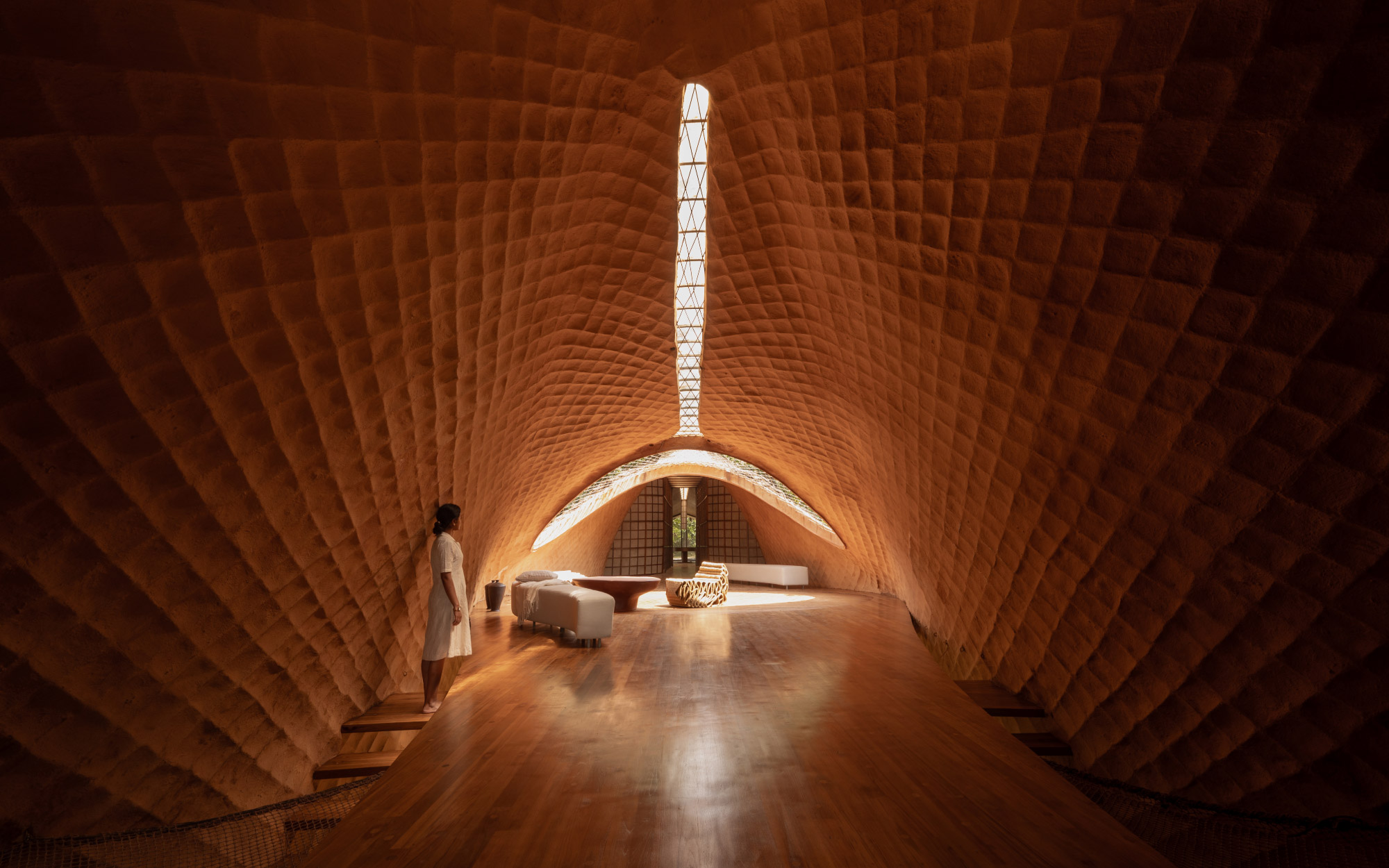 The living area opens up generously, offering a spacious, light-filled expanse that encourages gathering, movement, and ease. (Image Credits: Studio IKSHA)