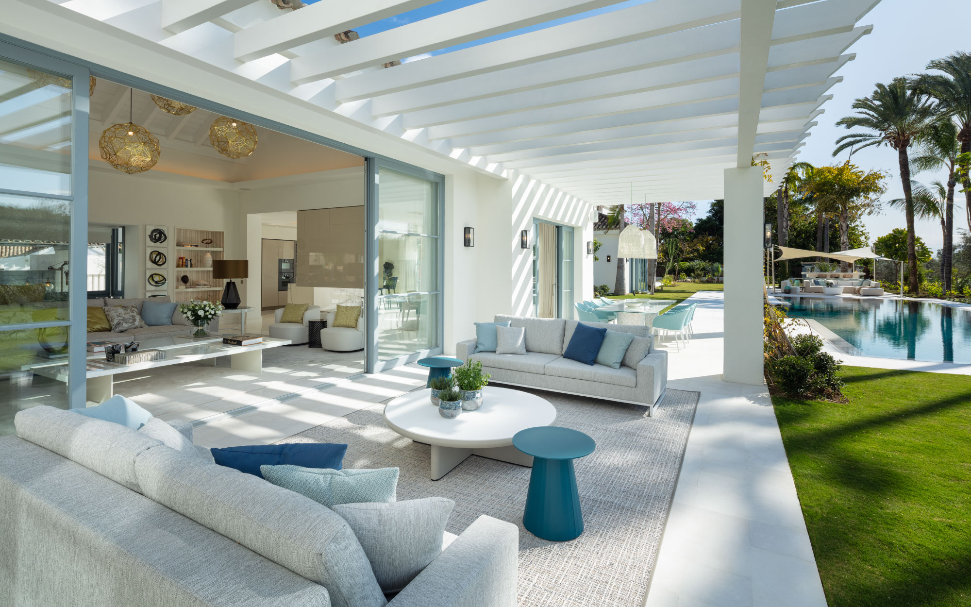 With frontline golf views and the surrounding landscape framing the villa’s pristine white architecture. (Image credits: Mandarin Oriental Exceptional Homes) 