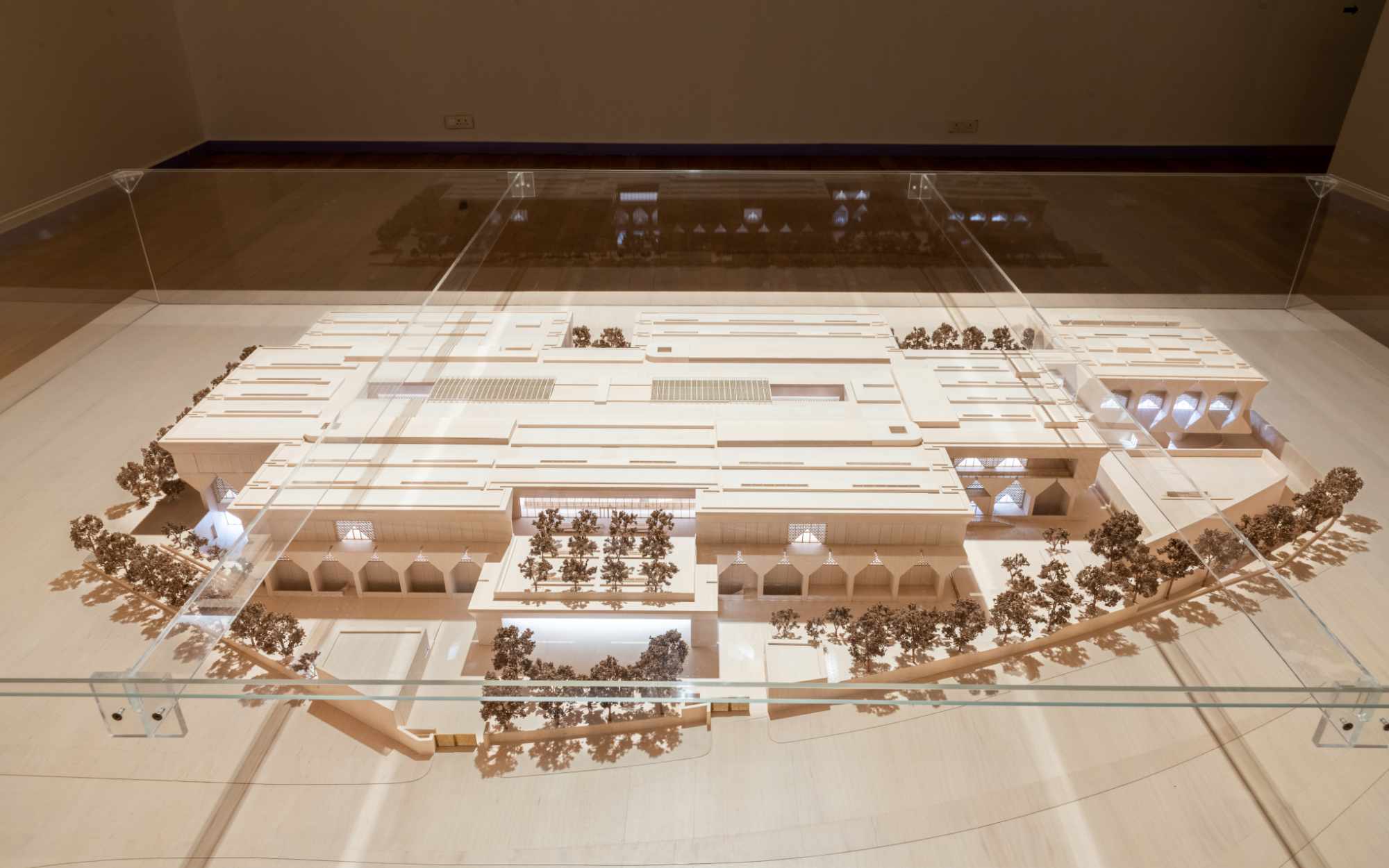 A detailed architectural model of the new KNMA, designed by Sir David Adjaye, blends influences from India’s rich history of multiple civilisations with the monumental volumes of post-independence Modernism. (Image Credits: Kiran Nadar Museum of Art) 
