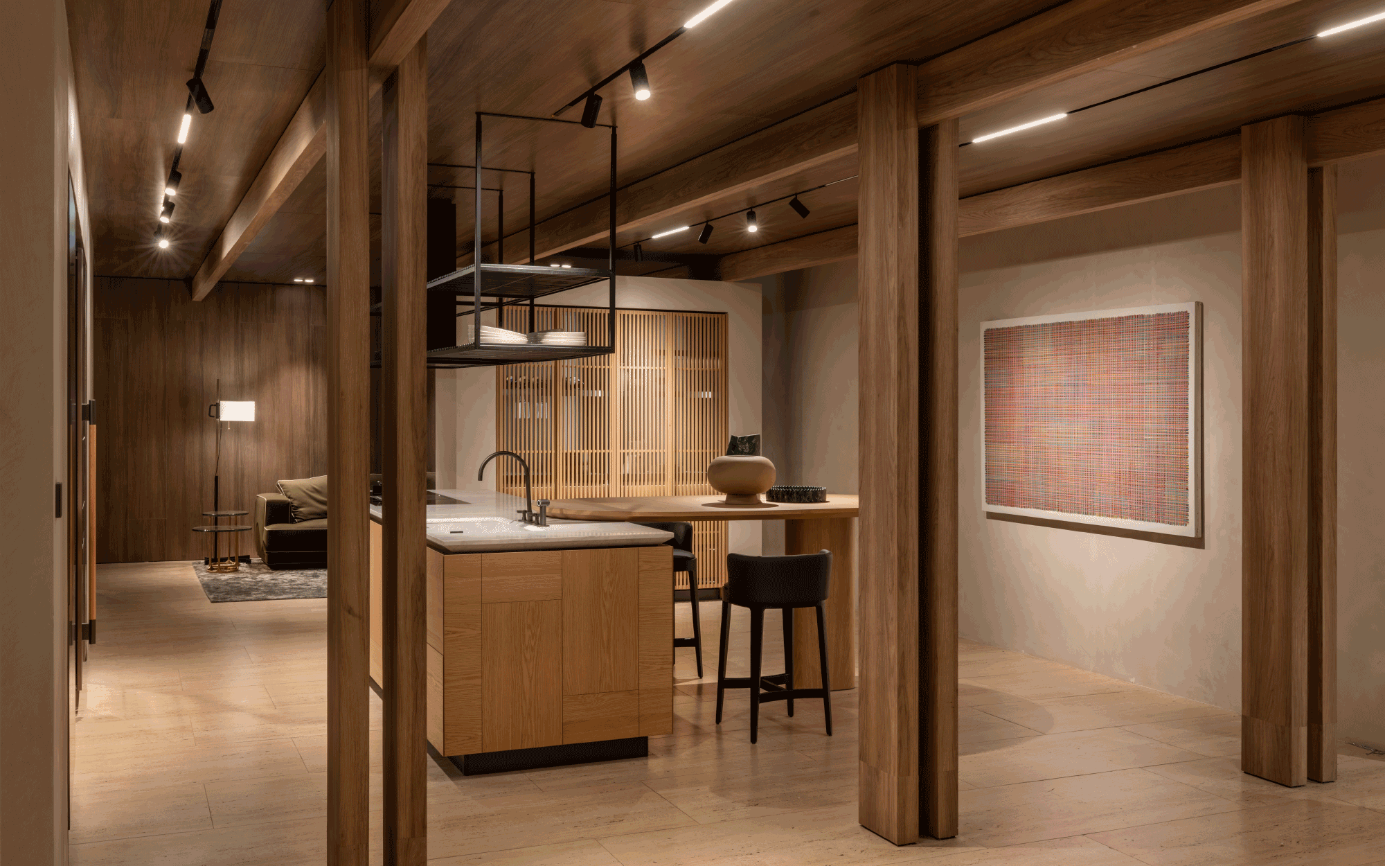 At the Molteni&C flagship in Mumbai, the kitchen unfolds around the sculptural Intersection island in natural stone, framed by the Atelier Columns designed by Vincent Van Duysen. (Image Credits: Courtesy of Molteni&C)