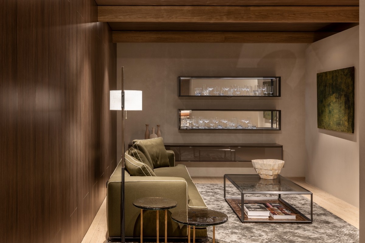 The bar area is enlivened by a striking Augusto green sofa by Vincent Van Duysen, adding a rich pop of colour to the refined setting at the Molteni&C flagship in Mumbai. (Image Credits: Courtesy of Molteni&C)