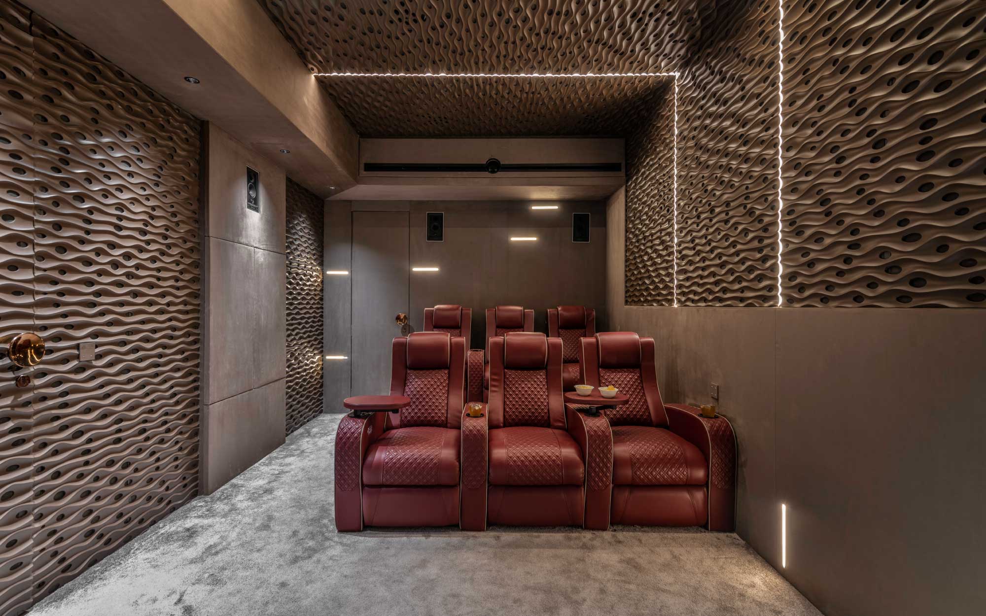 With sculpted acoustic panels by Chandras Art Studio, deep burgundy recliners, layered lighting by Maru lights and screen sourced from Kunal Kothari, the home theatre transforms into a cocooned sanctuary for immersive movie nights.The HVAC consultants maintaining a constant temperature are Nitin R AArora. (Image Credits: Phx India)

