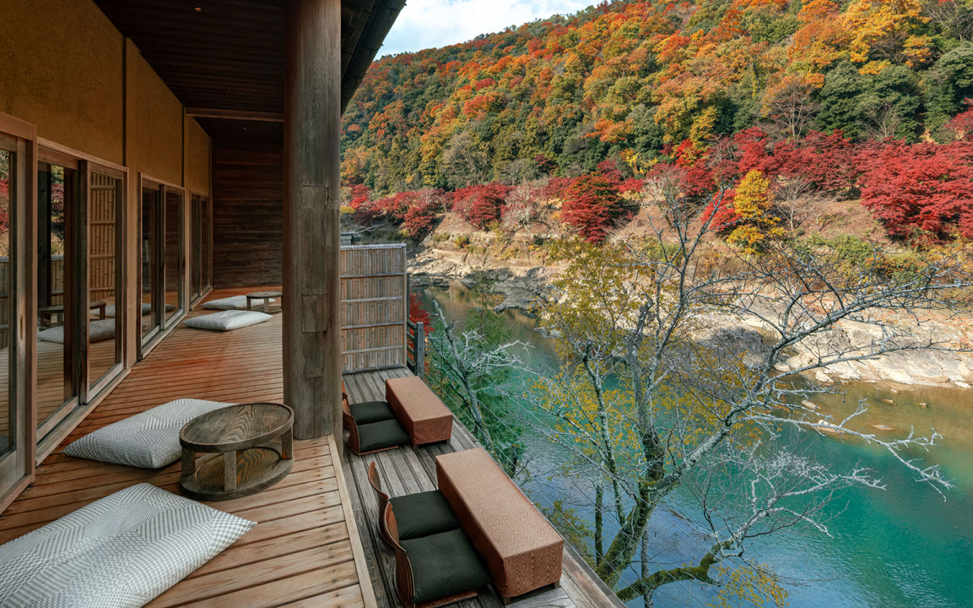Hoshinoya’s floating tea rooms are positioned along steep riverbanks to maximise the natural setting. (Image Credit: Hoshino Resorts)