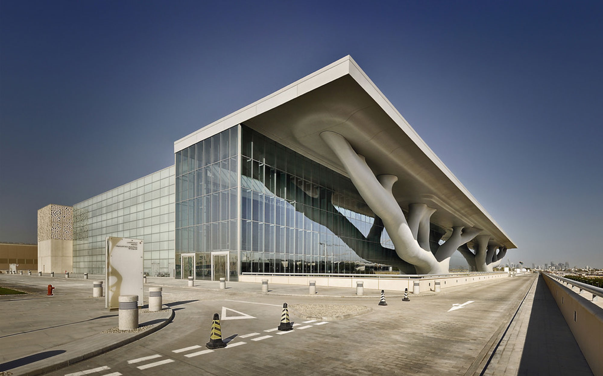 The Qatar National Convention Centre is defined by its iconic steel Sidra tree structure, a monumental fusion of engineering, culture, and symbolism. (Image Credits: Pygmalion Karatzas from Flickr)