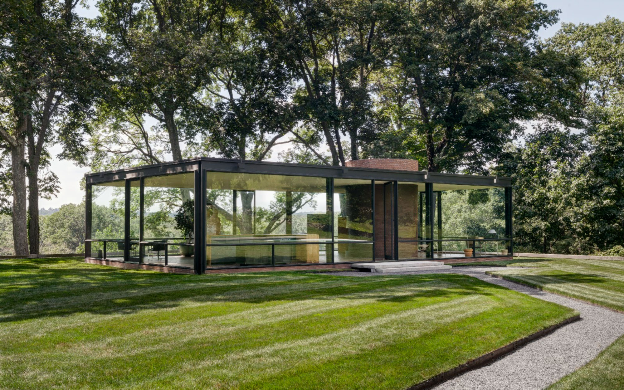 ‘Glass House’ in New Canaan, Connecticut, is a light-drenched pavilion perched on a rolling 47-acre meadow. (Image Credits: Michael Biondo)
