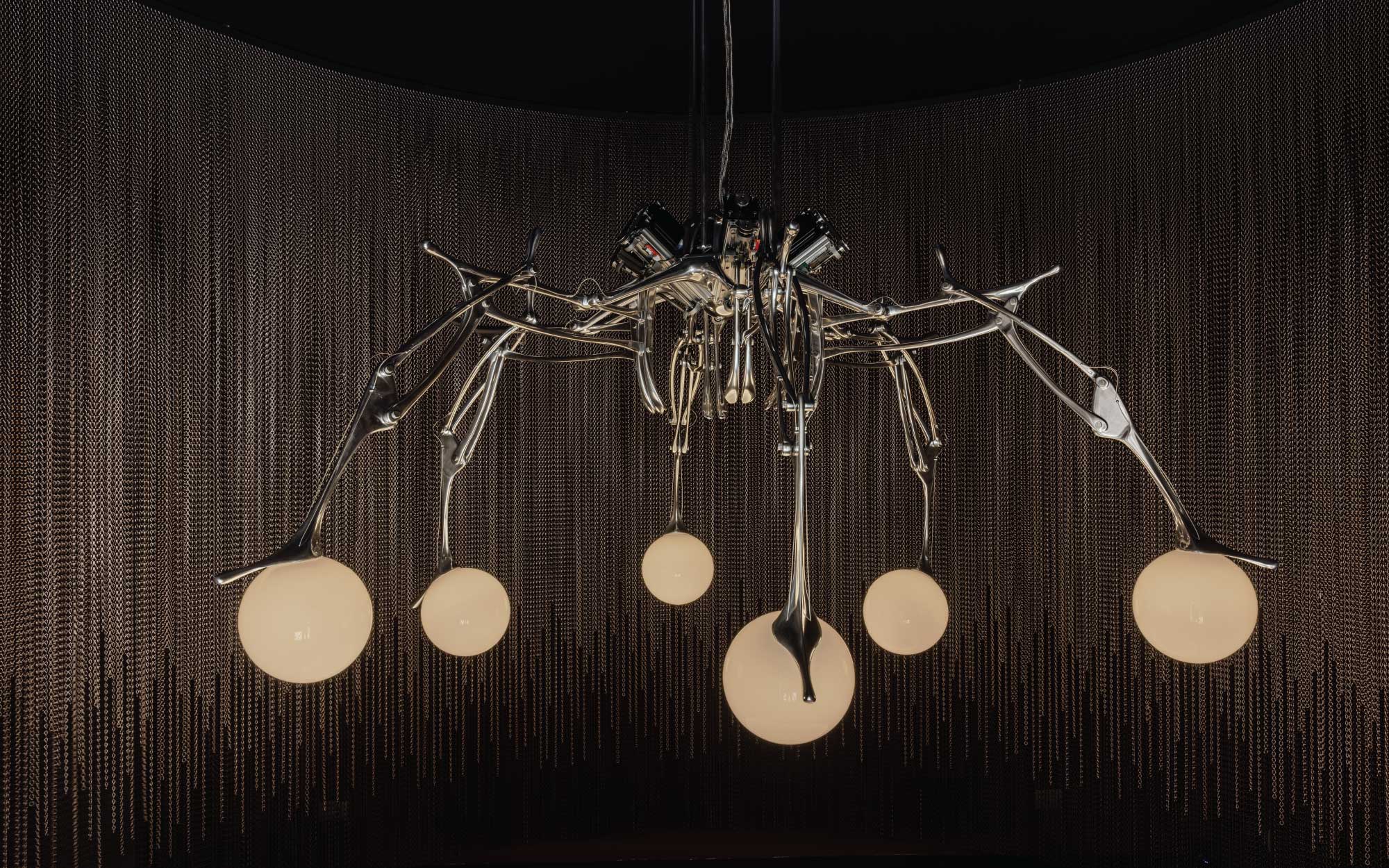 Nilufar’s LUMIAC transforms light into a kinetic, thinking organism, blurring the boundaries between machine intelligence, movement, and collectable design. (Image Credits: Alejandro Ramírez Orozco) 
