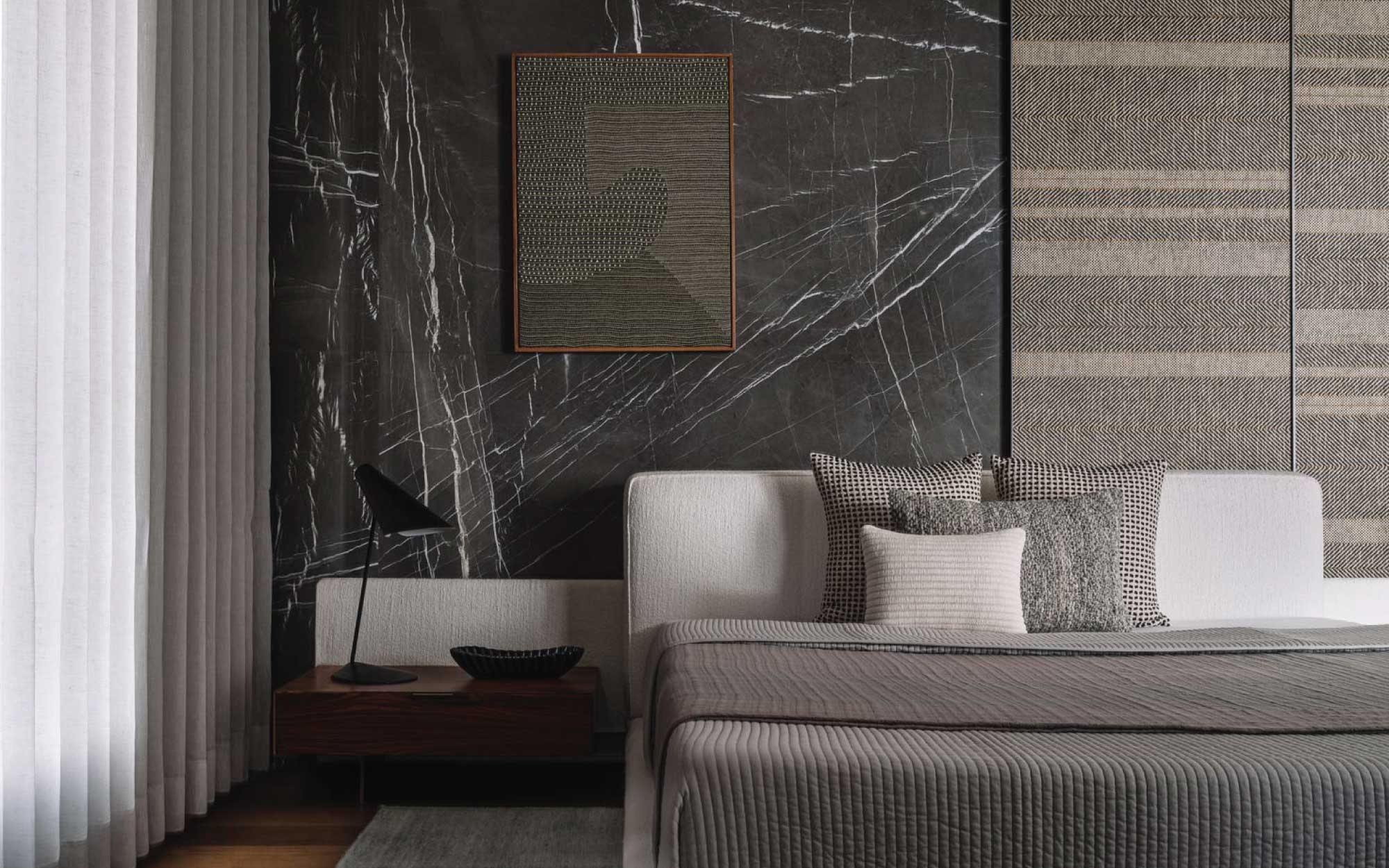 The wall-panelling in the master suite is from Omexco, while the artwork is from Dhaaga designs. (Image Credits: Ishita Sitwala)
