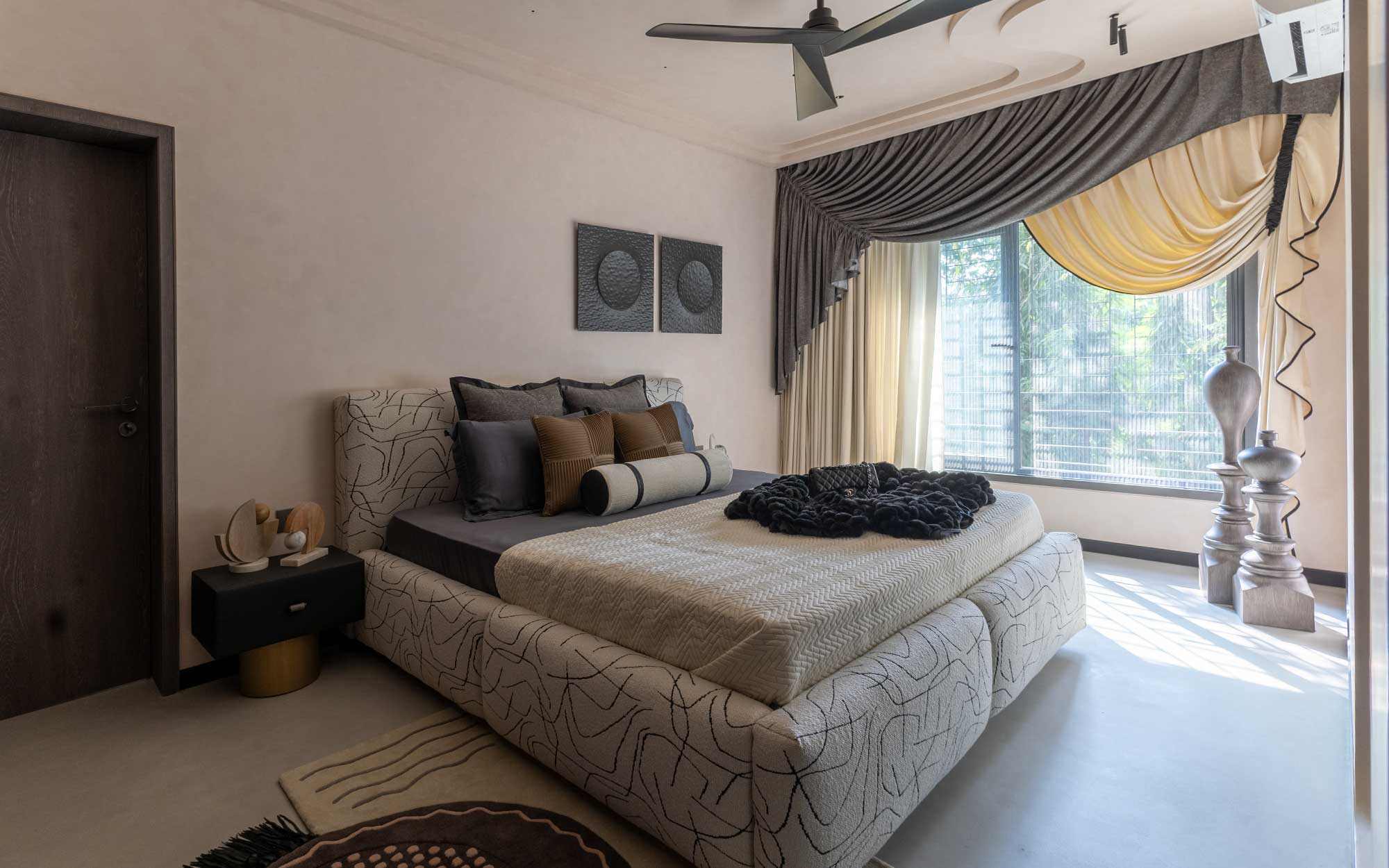 The master bedroom hosts progressive furniture by Casaira. Cushions and curtains by Beautiful Living add texture, colour and character to the space.
