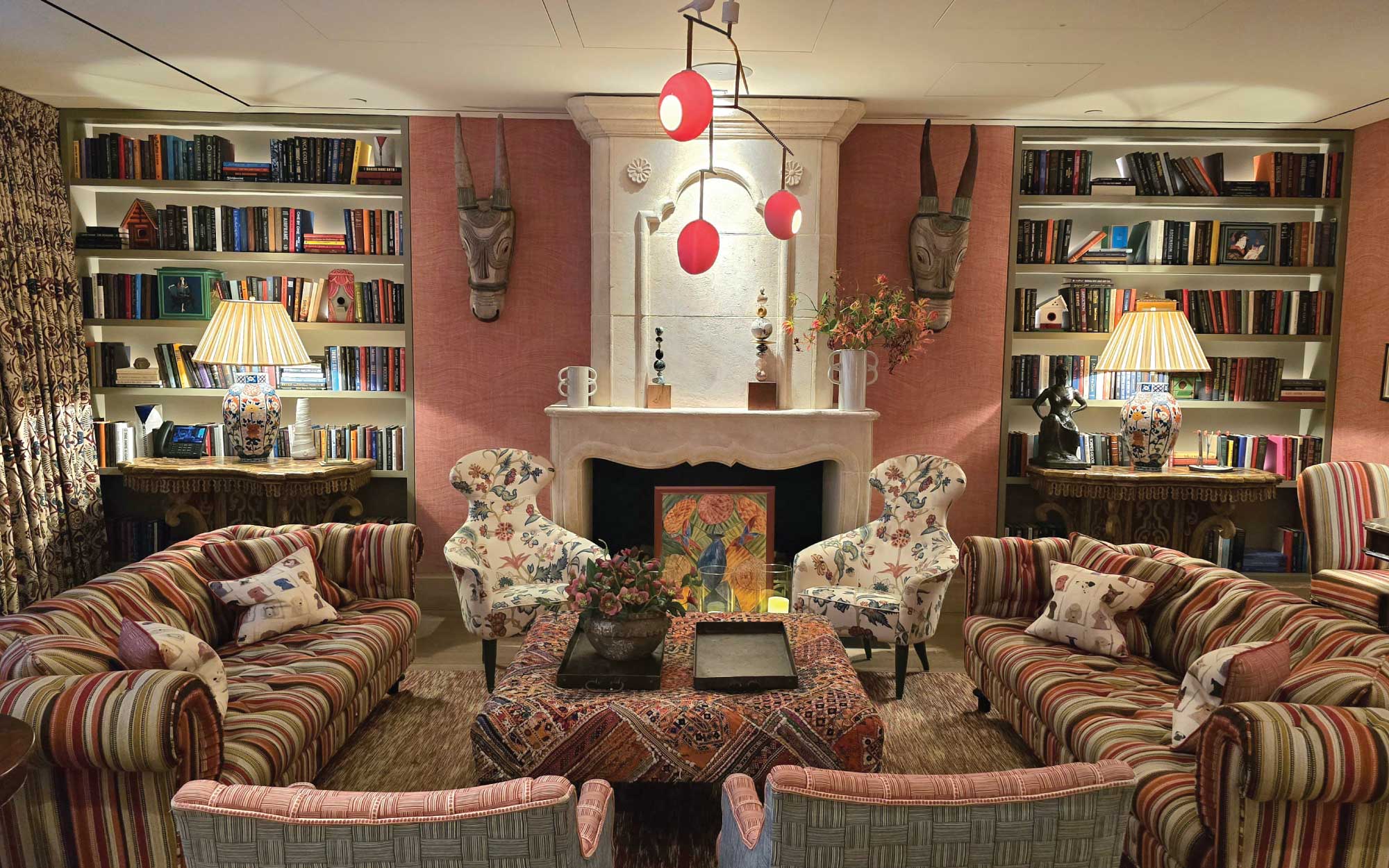 An embroidered cushion, contrast piping, a burst of colour on a frame, a hand-painted ceramic, or a whimsical piece of china—these crafted details bring charm and individuality, ensuring no two spaces feel exactly alike. 
( Image Credit: Warren Street Hotel, NYC) 
