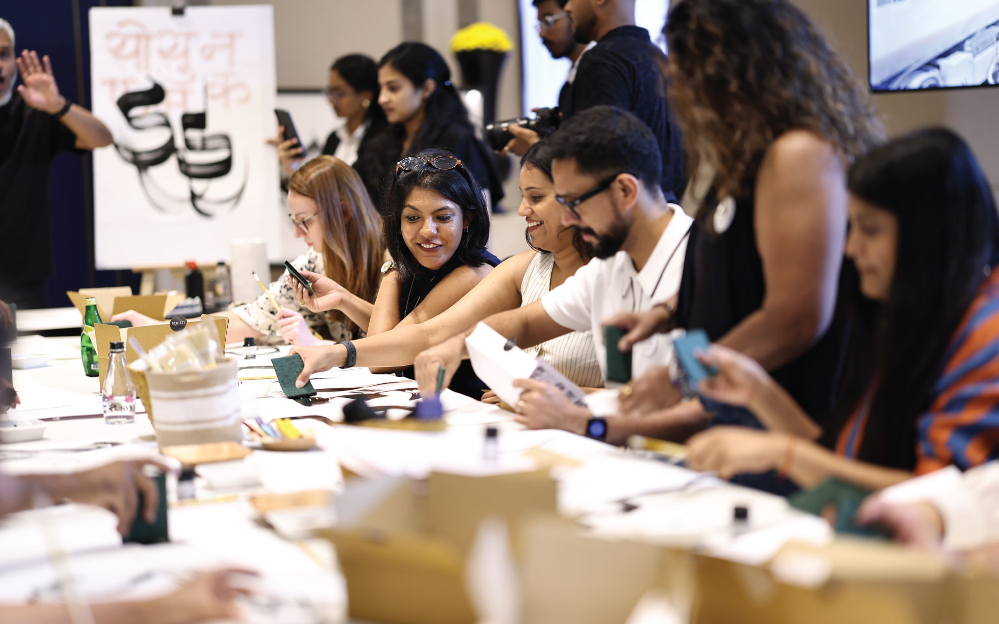 Guided by artist Nikheel Aphale, designers immersed themselves in the expressive beauty of Devanagari, tracing the intersection of script, memory and art. (Image Credits: Design Pataki) 