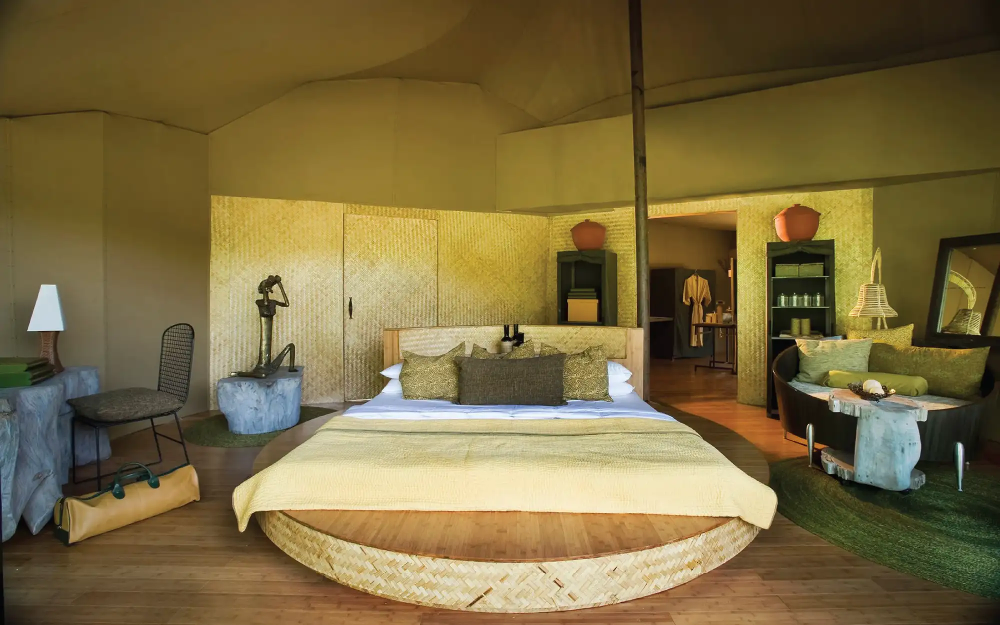 The tented suites blend vernacular craftsmanship with contemporary design, opening seamlessly onto the landscapes of Kanha. (Image Credits: Banjaar Tola, A Taj Safari)