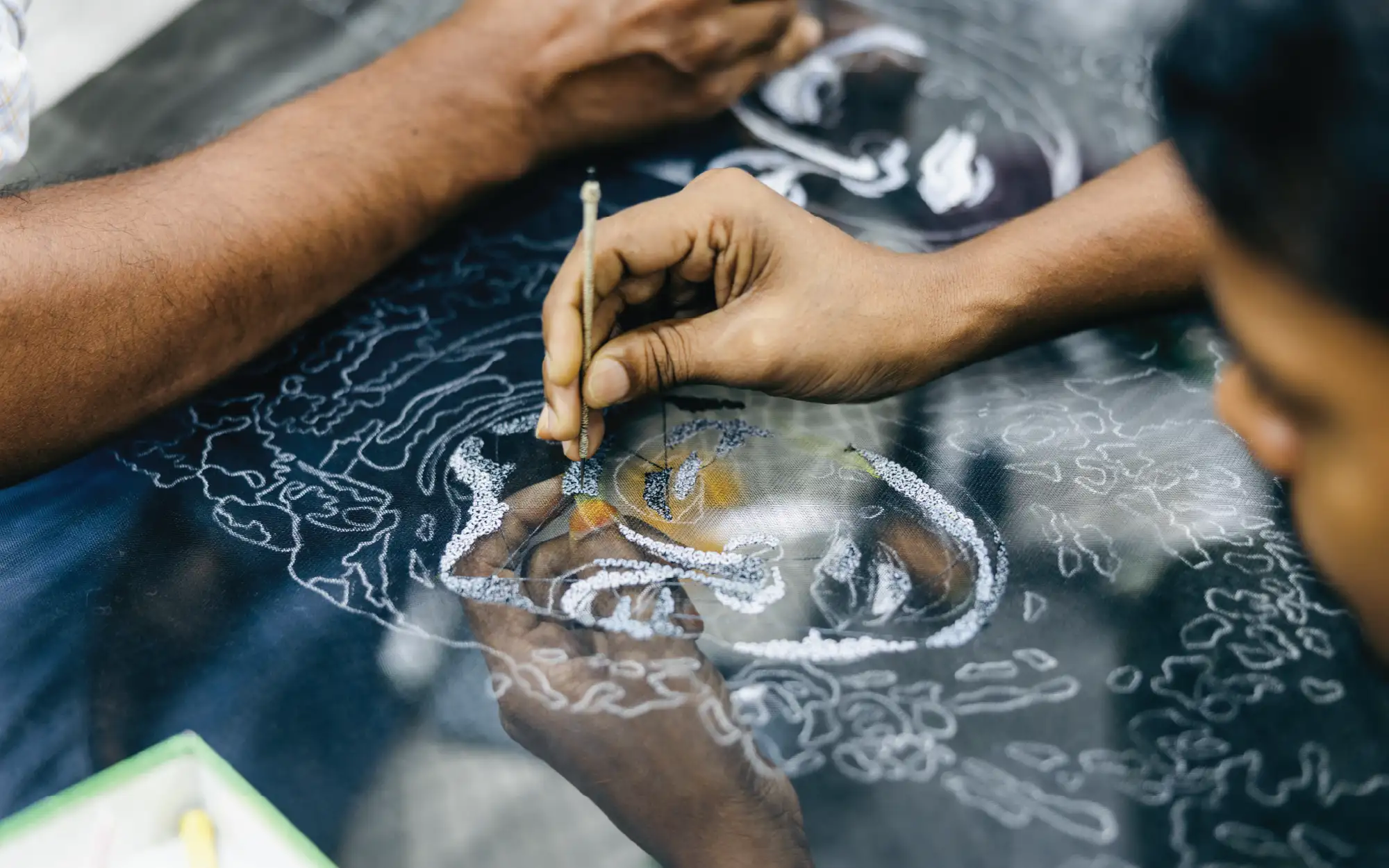 At the Rahul Mishra atelier, zardozi and dabka embroidery transform stones, crystals, and bugle beads into sculptural illusion. (Image Credits: Rahul Mishra)