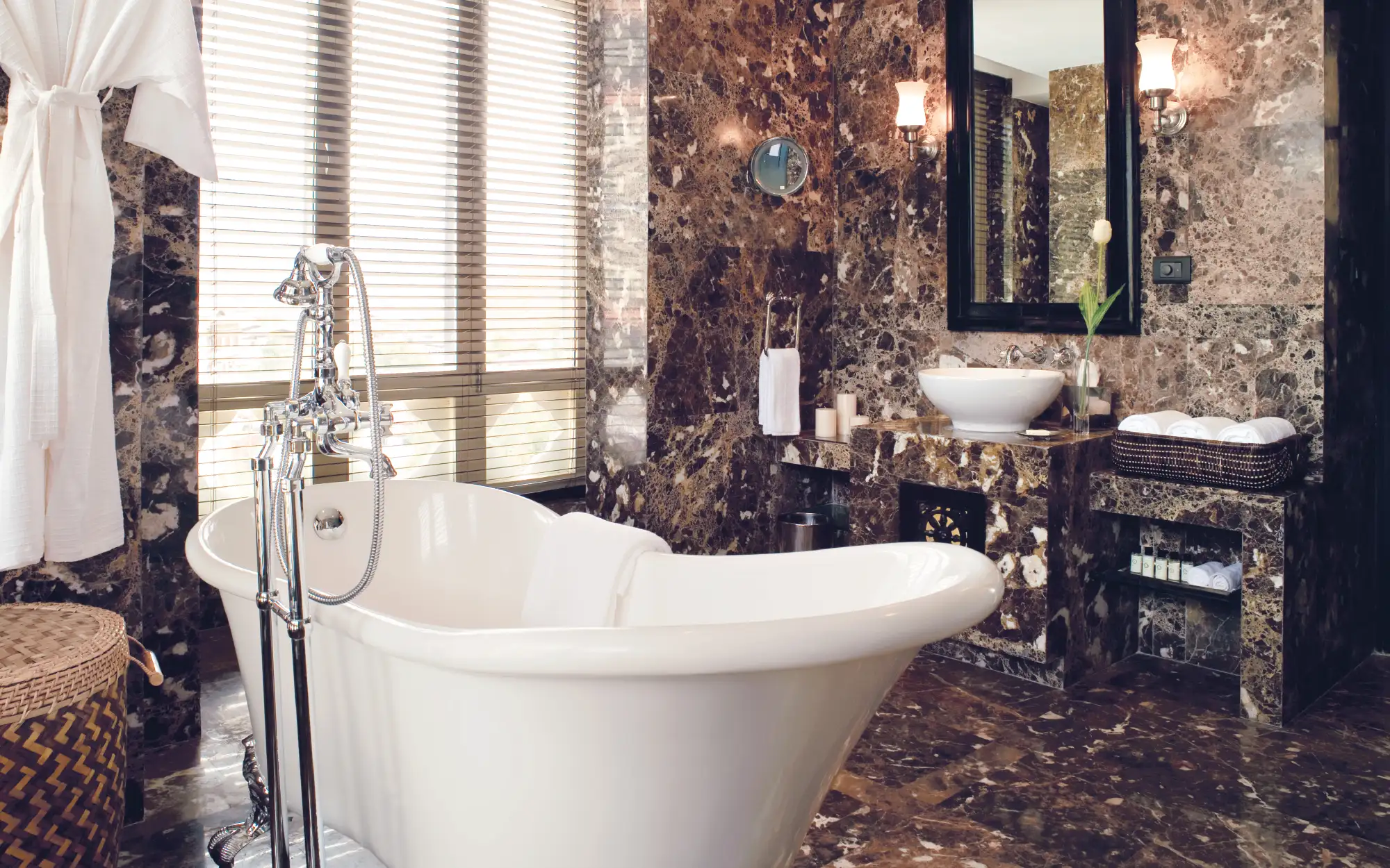 A stunning marble master bathroom features luxurious organic details. (Image Credit: Pemako Bhutan) 